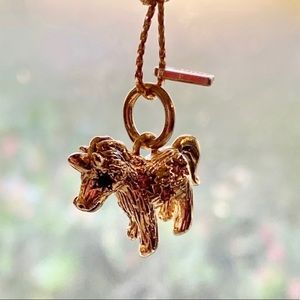 Coach uni mini charm